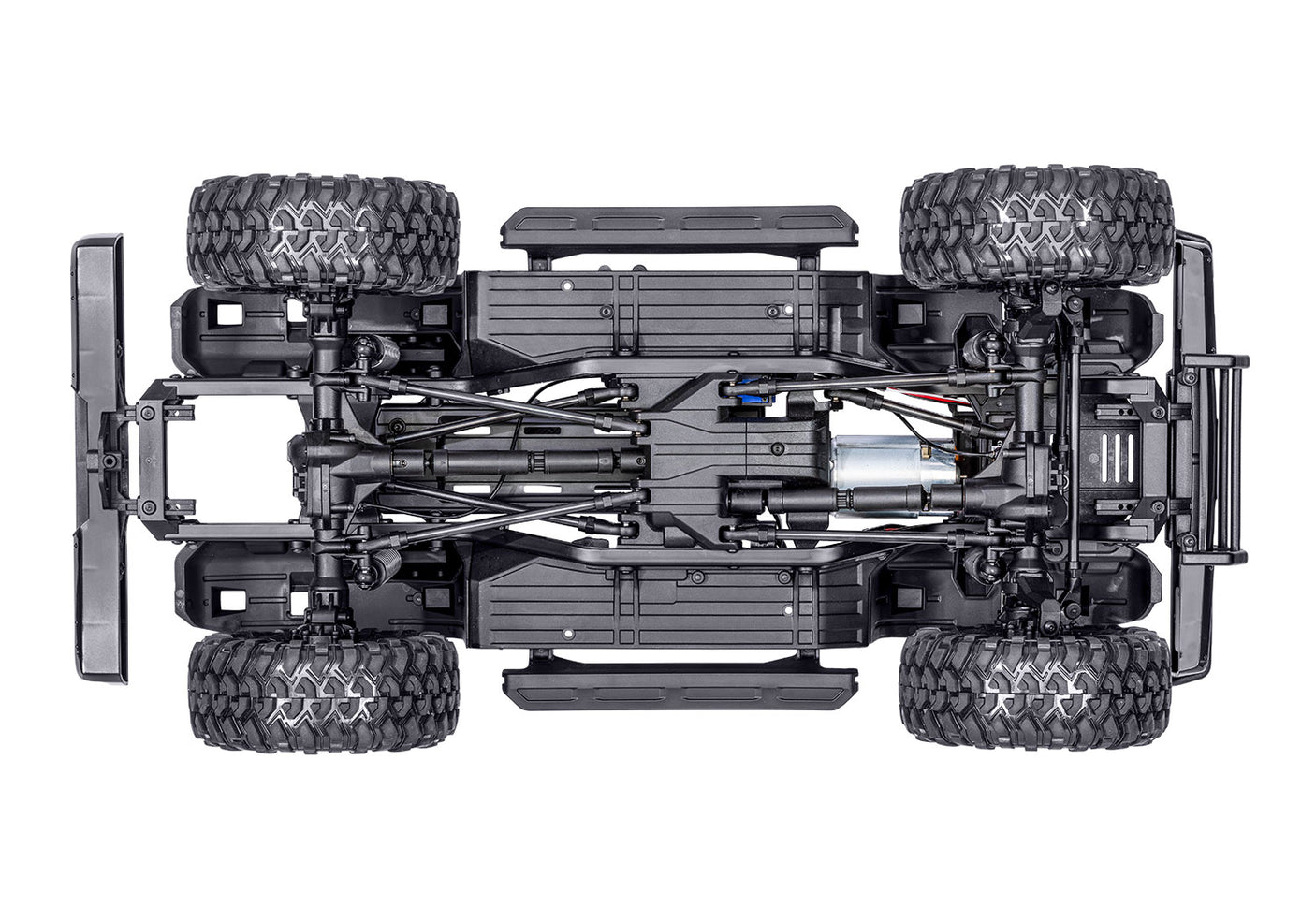Traxxas TRX-4 Nissan Pathfinder RC truck chassis bottom view showing detailed suspension and drivetrain components.