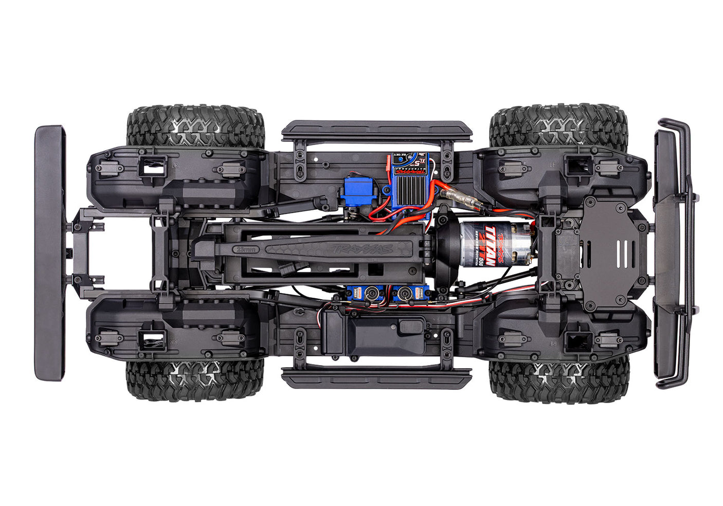 Overhead view of the chassis for the Traxxas TRX-4 Nissan Pathfinder RC vehicle with detailed suspension and drivetrain components.