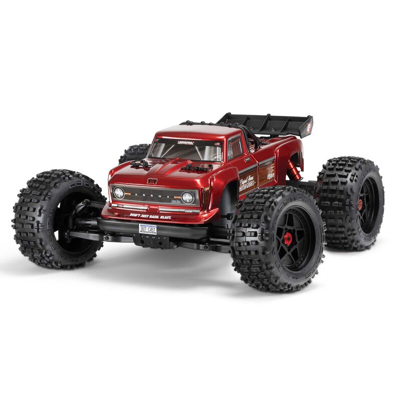 ARRMA Outcast 4X4 4S 1/10th scale 4WD stunt truck, rugged off-road RC vehicle with large tires and detailed suspension.