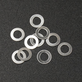 Set of ten Xpress steel spacers, 3x5x0.2mm, small metal components for electronics or DIY projects.