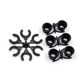 Xpress Pivot Inserts for Graphite Lower Arm, close-up view showing precision-machined metal components for RC car upgrades.