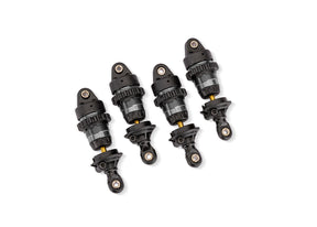 Gray aluminum mini GTR short shocks for Traxxas RC cars, shown in a close-up image highlighting their compact design.