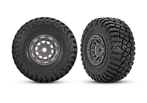 Pair of Traxxas 1.4-inch gray wheels with BFG mud-terrain tires for RC trucks, shown in the image.