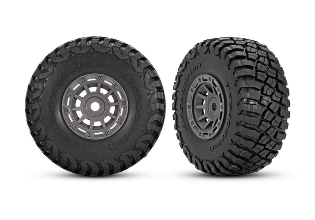 Pair of Traxxas 1.4-inch gray wheels with BFG mud-terrain tires for RC trucks, shown in the image.