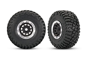 Traxxas black and chrome 1.4-inch wheels with BFG mud-terrain tires for RC trucks, shown in the image.