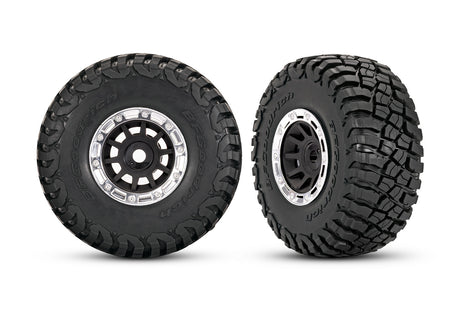 Traxxas 1.4-inch black and chrome wheels with BFG mud-terrain tires for RC trucks, shown with two assembled wheel and tire sets.
