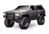 Traxxas TRX-4 Nissan Pathfinder radio-controlled scale model showing front three-quarter view with detailed exterior design.