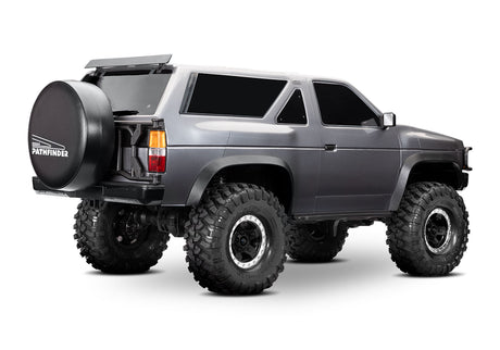 Traxxas TRX-4 Nissan Pathfinder remote control off-road vehicle rear passenger side view, detailed model with rugged design.