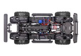 Overhead view of the chassis for the Traxxas TRX-4 Nissan Pathfinder RC vehicle with detailed suspension and drivetrain components.