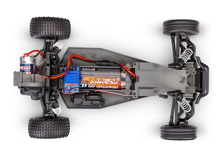 Overhead view of Traxxas Bandit XL-5 remote control car chassis with battery installed, showcasing its lightweight design and components.