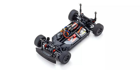 Kyosho 1/10 scale 4WD Fazer Mk2 FZ02 Toyota Celica GT RC car on display, detailed body and wheels visible.