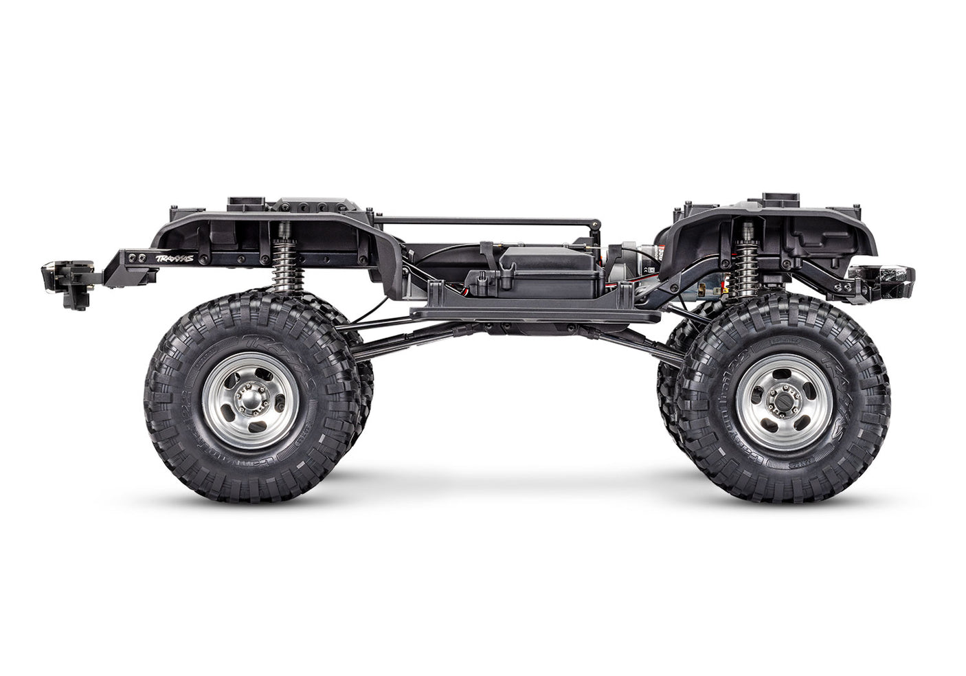 Side view of Traxxas TRX-4 Ford F-150 High Trail Edition RC truck chassis with detailed off-road design.