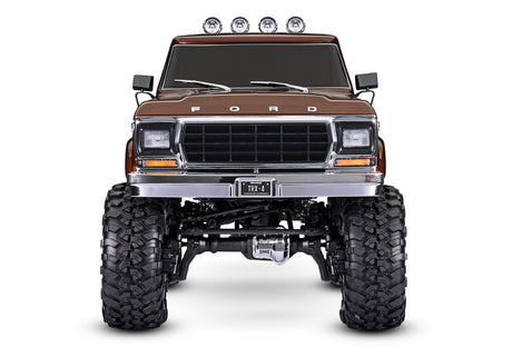 Traxxas TRX-4 Ford F-150 High Trail Edition RC truck front view with detailed brown body and off-road tires
