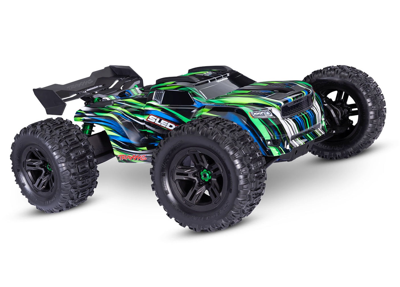 Traxxas 1/8 Sledge belted RC truck with green and RGB front tires, showing detailed close-up of the front wheel and tire tread.