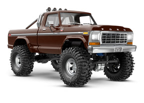 Traxxas TRX-4M Ford F-150 High Trail Edition remote control truck front quarter view in brown with detailed exterior features.