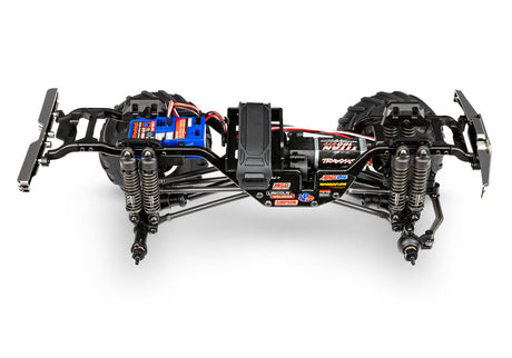 Traxxas TRX-4MT Ford F-150 RC car chassis side view without wheels, showing detailed scale model construction and design features.