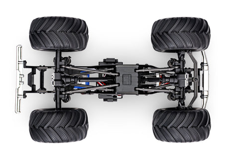 Traxxas TRX-4MT Ford F-150 RC monster truck chassis bottom view showing detailed suspension and drivetrain components.