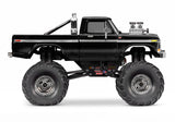 Traxxas TRX-4MT Ford F-150 RC Monster Truck side view, black off-road RC car with detailed body and rugged tires.