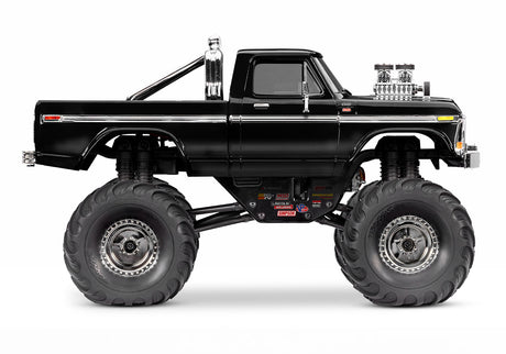 Traxxas TRX-4MT Ford F-150 RC Monster Truck side view, black off-road RC car with detailed body and rugged tires.