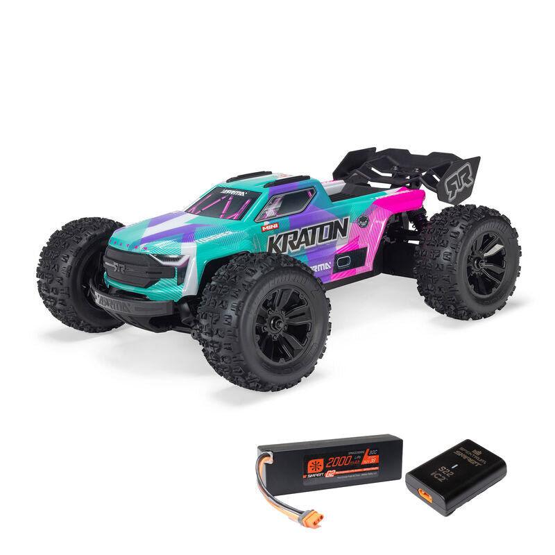 ARRMA 1/16 Mini Kraton 3s RC car with charger and battery, shown on a smooth surface with detailed body and large tires.