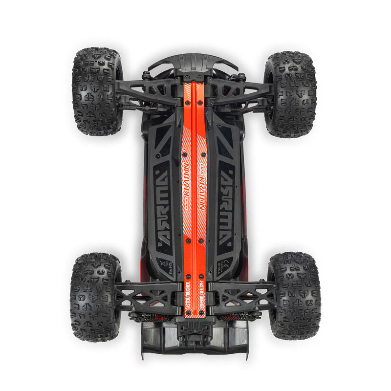 ARRMA 1/16 Mini Kraton 3S RC monster truck with orange and black body, rugged tires, and detailed chassis.
