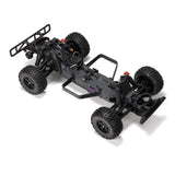ARRMA 1/10 scale Fury 223S DSC 2WD RTR brushless short course truck on a track, showcasing its rugged design and vibrant color scheme.