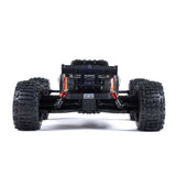 ARRMA Outcast 4X4 4S 1/10th scale 4WD stunt truck with rugged design and bright orange color, ready for off-road action.