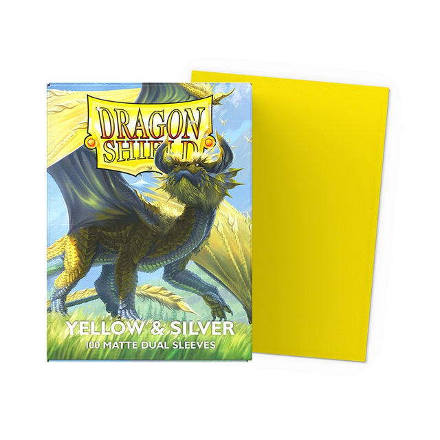 Yellow and silver dual matte standard card sleeves by Dragon Shield, featuring a protective design for trading cards.