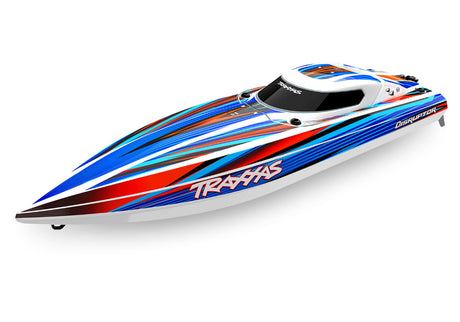 Traxxas Disruptor 26-inch VXL 4S blue remote control boat on water, showcasing high-speed RC boat with vibrant blue design.