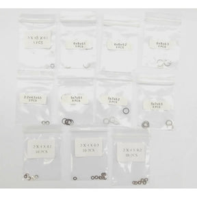 GL Racing Giulia shim set GG-S-031, close-up of metal shims with precise edges, used for automotive adjustments and tuning.
