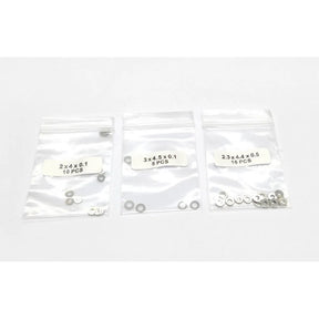 GL Racing GL-GTR Shim Set (GL-GTR-S-041) with multiple metal shims in packaging for engine tuning and maintenance.