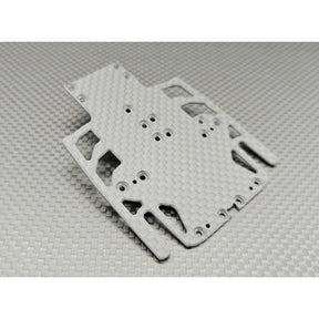 Wide carbon chassis for LMP2 race car by GL Racing, showing sleek aerodynamic design and lightweight construction.