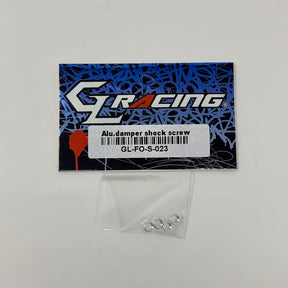 GL Racing aluminum damper shock screw for Formula One RC cars, showing the precise metal component with threading and mounting features.