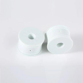 Pair of ivory LC Racing L6150 EMB Truggy wheels with detailed tread pattern for RC off-road vehicles.