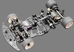 Atomic RC MRX Master Edition 2WD chassis with linkless suspension system for high-performance remote control car.
