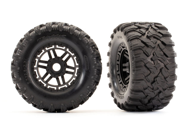 Traxxas Maxx 2.8-inch black wheels with Maxx MT tires for RC car off-road performance, shown on the wheels and tires.