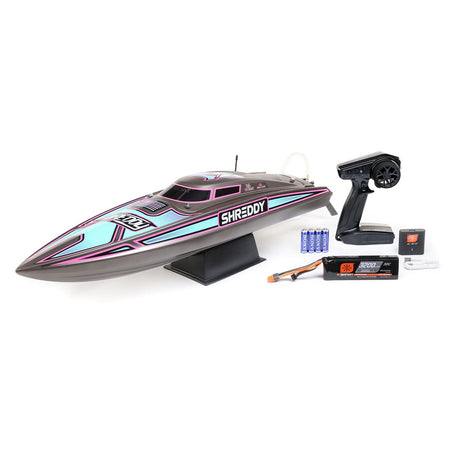 Proboat Heatwave Recoil 2 V2 26" self-righting boat in action on water, showcasing its sleek design and vibrant colors.