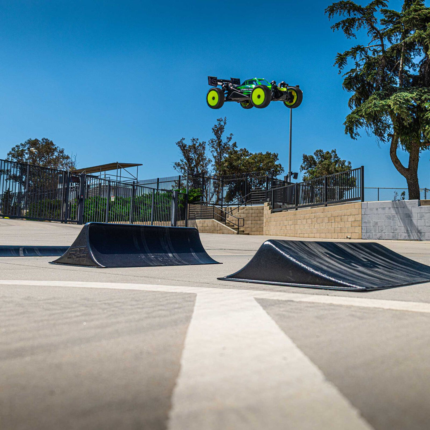 Proline Big Air Triple RC Ramp Set with three colorful plastic ramps for remote control car jumps and stunts.