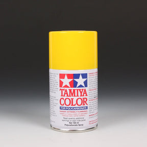 Tamiya PS-6 Yellow spray paint can, 100ml, with yellow spray nozzle and label showing product details.