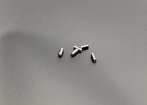 Reflex Racing RX28-039 M2x4mm set screws for RC car parts, showing small metal screws with threading and hex heads.