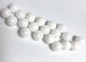 Reflex Racing RX409 2.381 zirconium oxide ceramic balls for RC car parts, showing smooth, spherical ceramic bearings.
