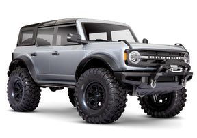 Traxxas TRX-4 2021 Ford Bronco 4x4 RTR crawler in silver, showing detailed exterior and rugged off-road design.