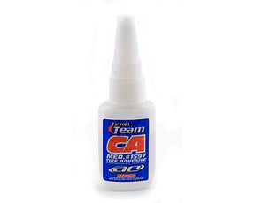 Factory Team Medium Tire Adhesive applied to a tire, demonstrating strong bonding for racing and off-road vehicle tires.