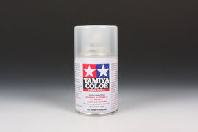 Tamiya TS-65 Pearl Clear Spray Paint 100ml bottle, showcasing the shimmering pearl finish with the spray nozzle visible.