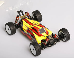 LC Racing LC12B1-HK 1/12 scale 4WD competition buggy kit with detailed chassis and suspension components, ready for assembly