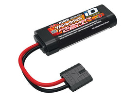 Traxxas 1200mAh 7.2V 6-Cell NiMH battery for RC vehicles, shown with orange and black casing and connectors.