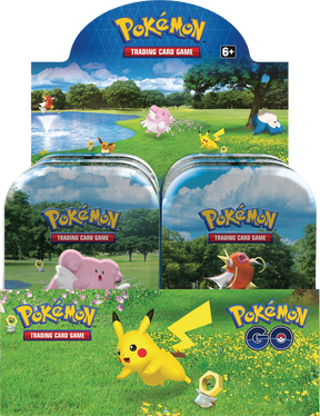 Assorted Pokémon GO Mini Tins with Pokémon trading cards displayed, featuring colorful tins and card packs from the Pokémon brand.