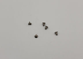 Reflex Racing RX28-024 M2x3mm countersunk screws for RC car parts, shown in close-up with shiny metal finish.